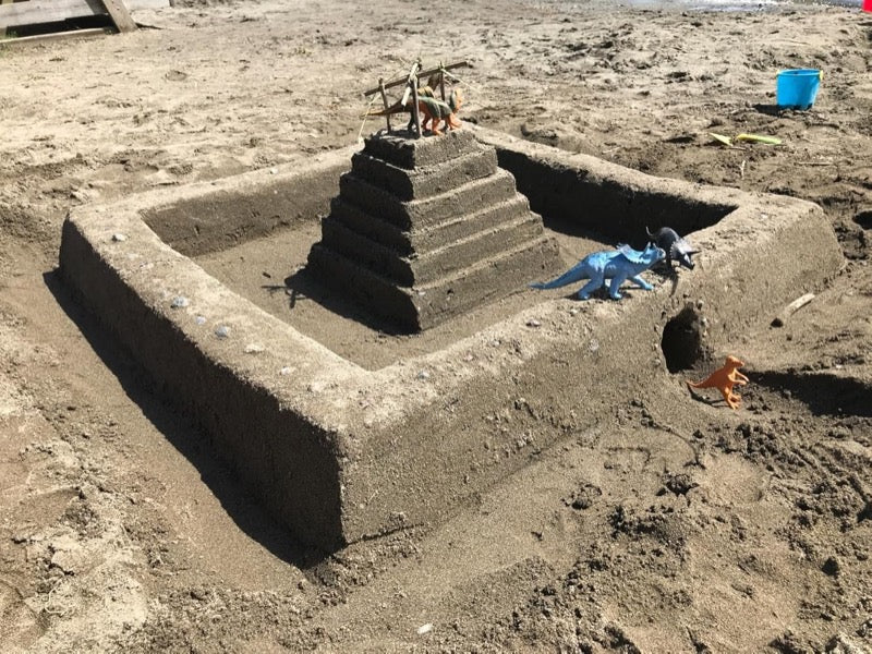 Stepped pyramid castle and sea serpent